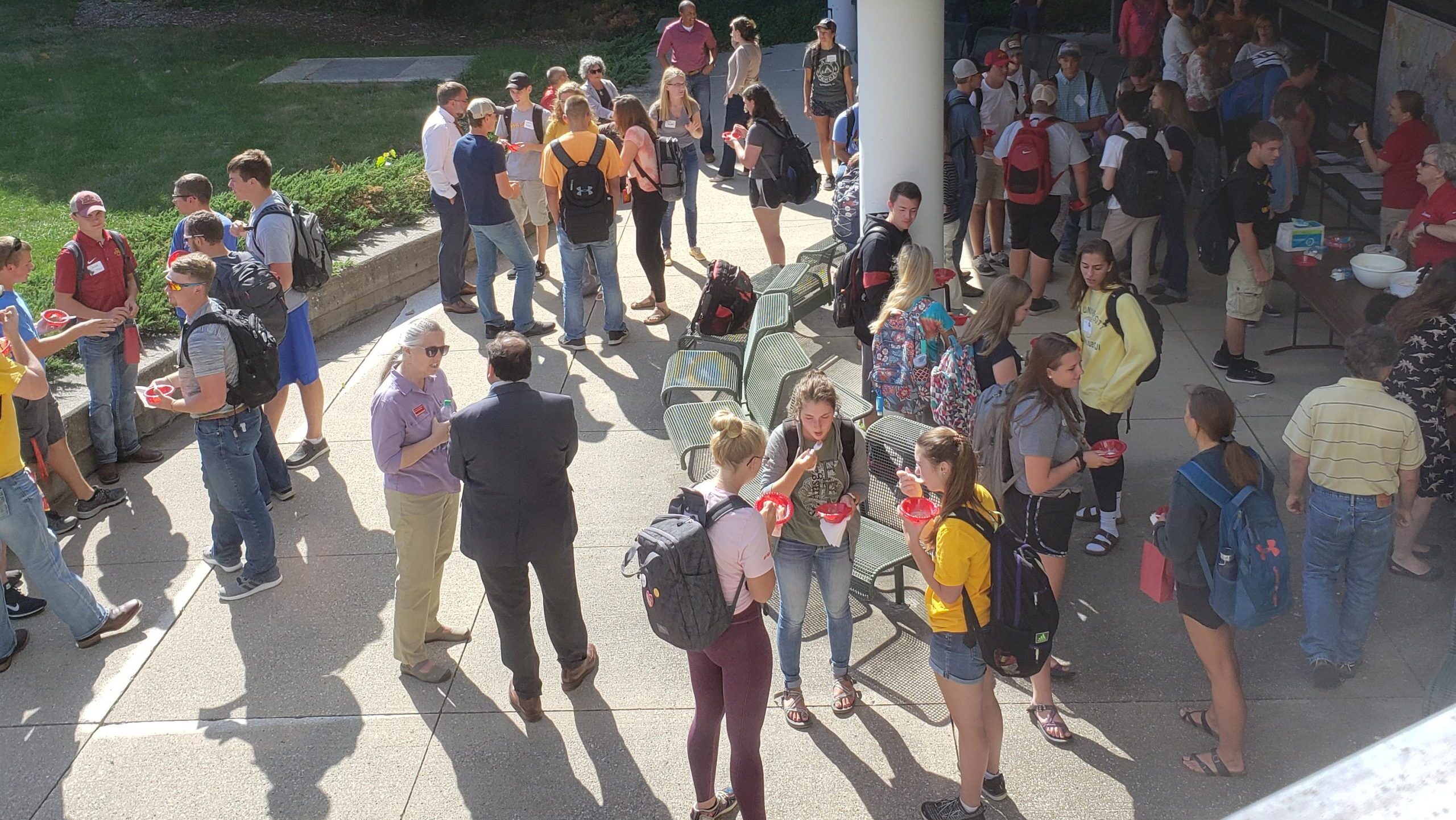 People gathered on the agronomy building courtyard