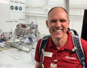 Brian Hornbuckle with Europa satellite.