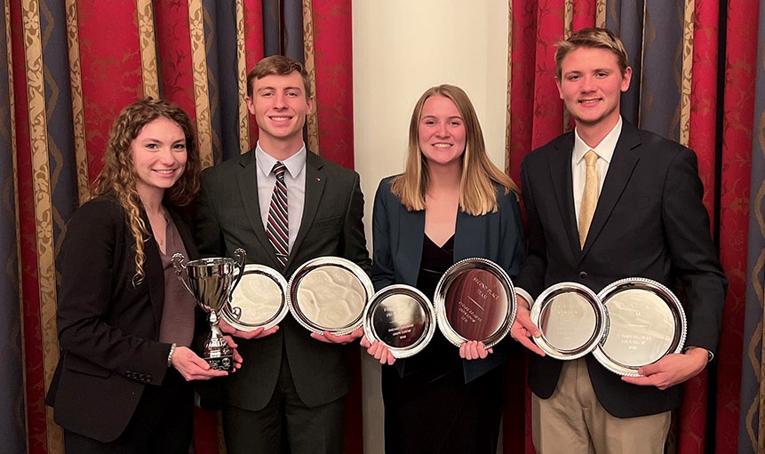 The ISU Crops Team from left: Elizabeth Tranel, Tyler Atkinson, Courtney Harle, and Aidan Bobholz with some of their awards.