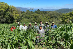 Hokanson (back row, third from right) with a group of farmers in Honduras.